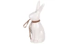 Velikonoční dekorace Soška zajíc s pírkem, 13 cm, bílá